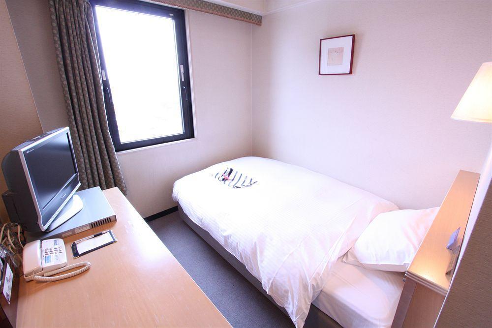 Apa Hotel Tonami Ekimae Esterno foto
