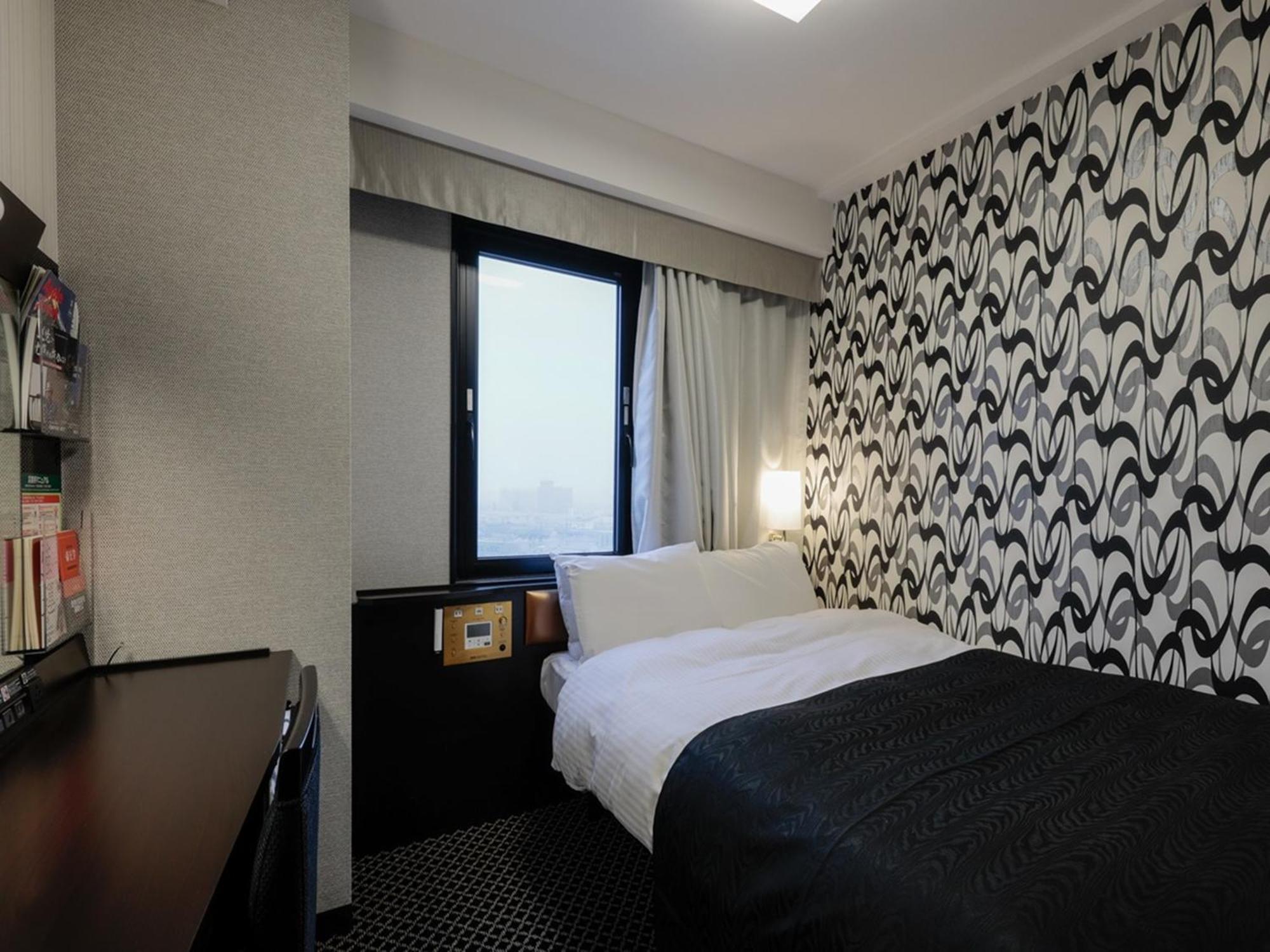 Apa Hotel Tonami Ekimae Esterno foto