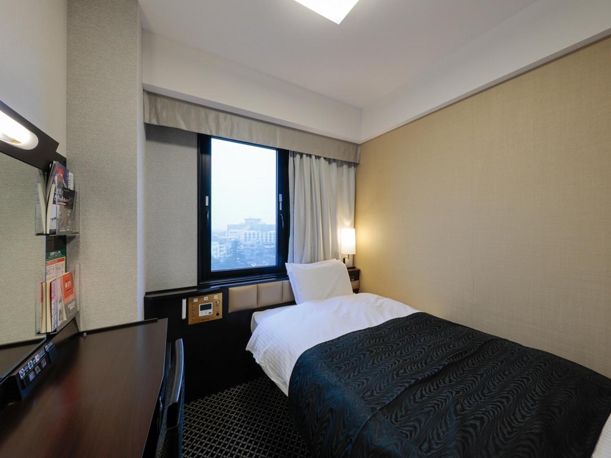 Apa Hotel Tonami Ekimae Esterno foto