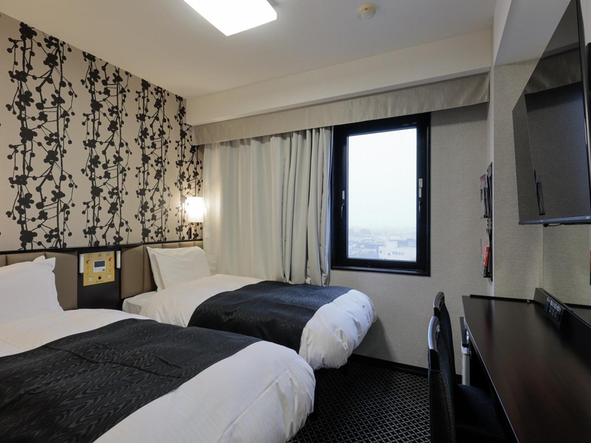 Apa Hotel Tonami Ekimae Esterno foto